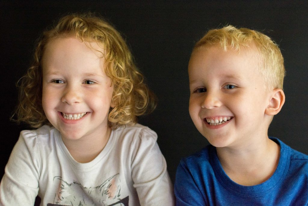 example photo: two kids smiling